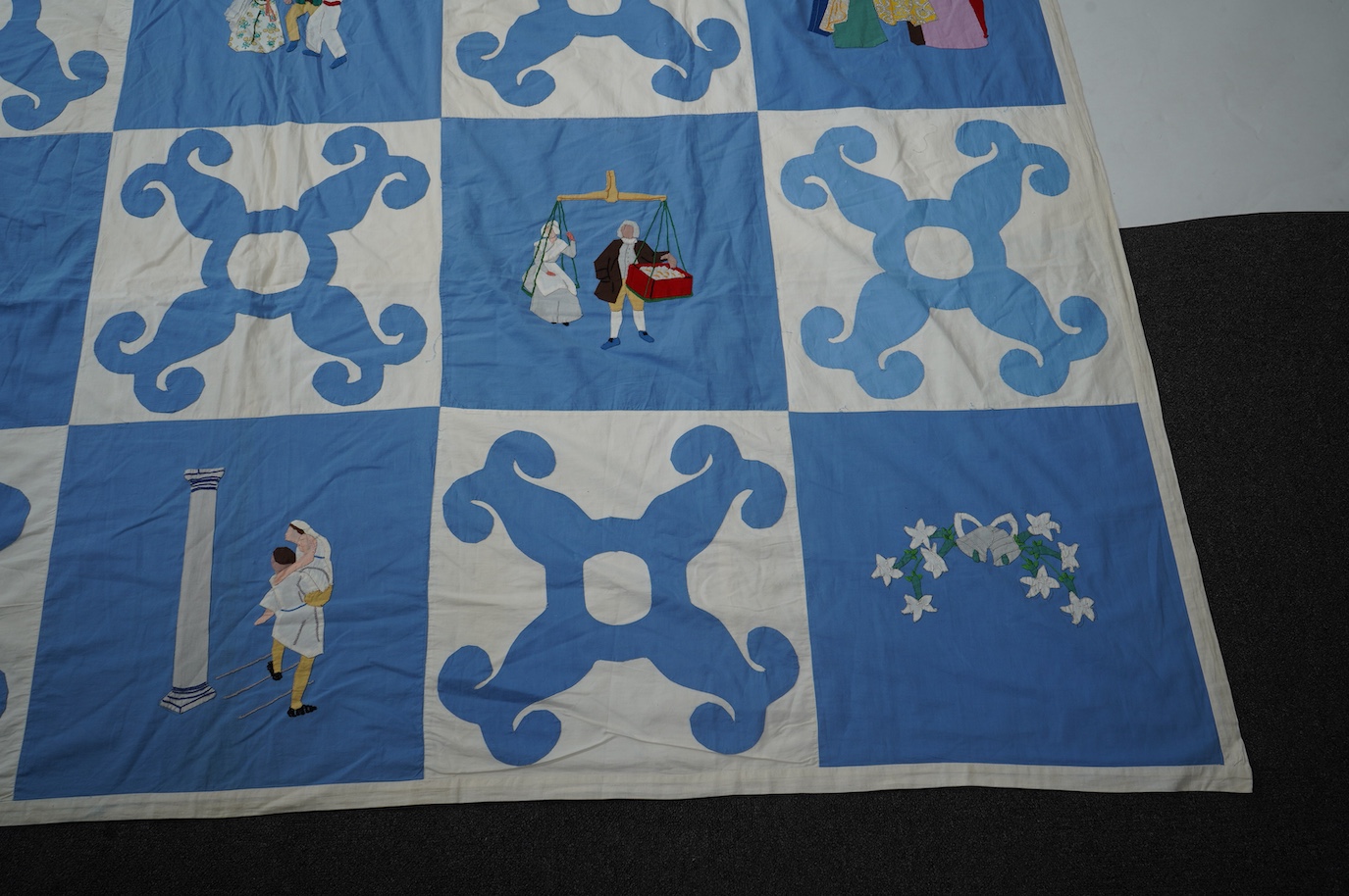 A rare figurative American ‘bridal quilt coverlet’, designed by Marion Cheever Whiteside Newton, whose designs were originally widely published in magazines and sold during the 1940’s-50’s. Her ‘quilting kits’ were also